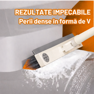 Perie DreamRamp cu perii dense în formă de V, curățând un colț cu spumă